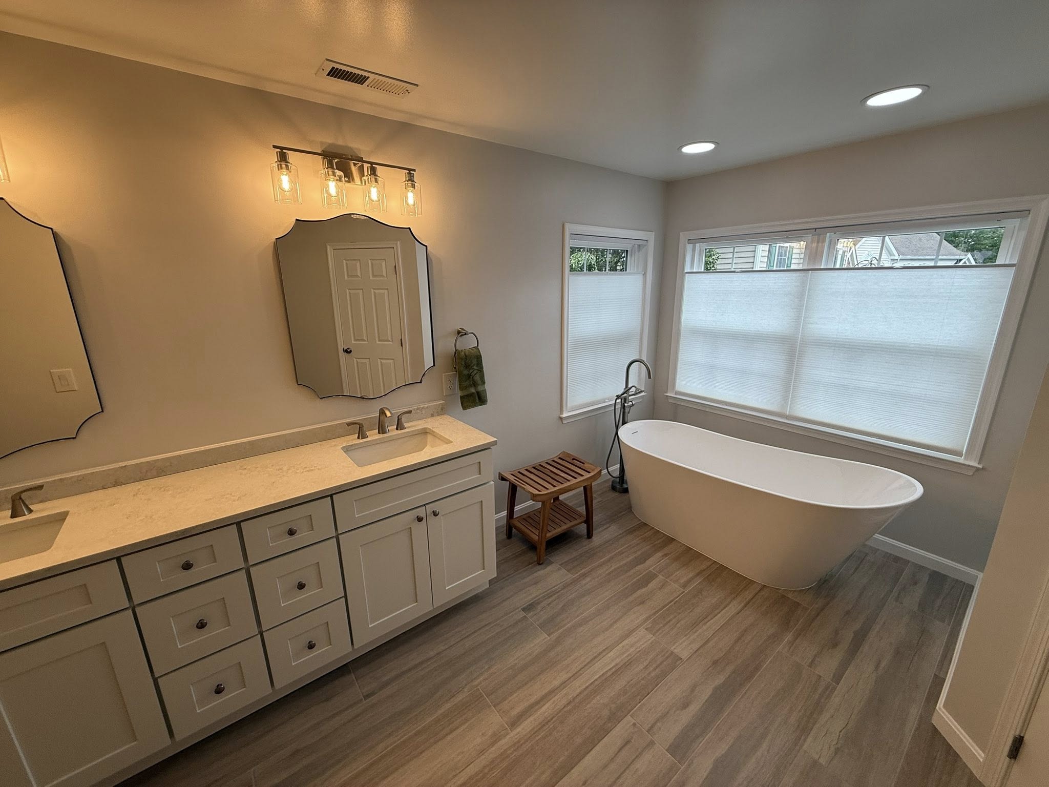 Fully remodeled bathroom showcasing contemporary upgrades and cohesive style