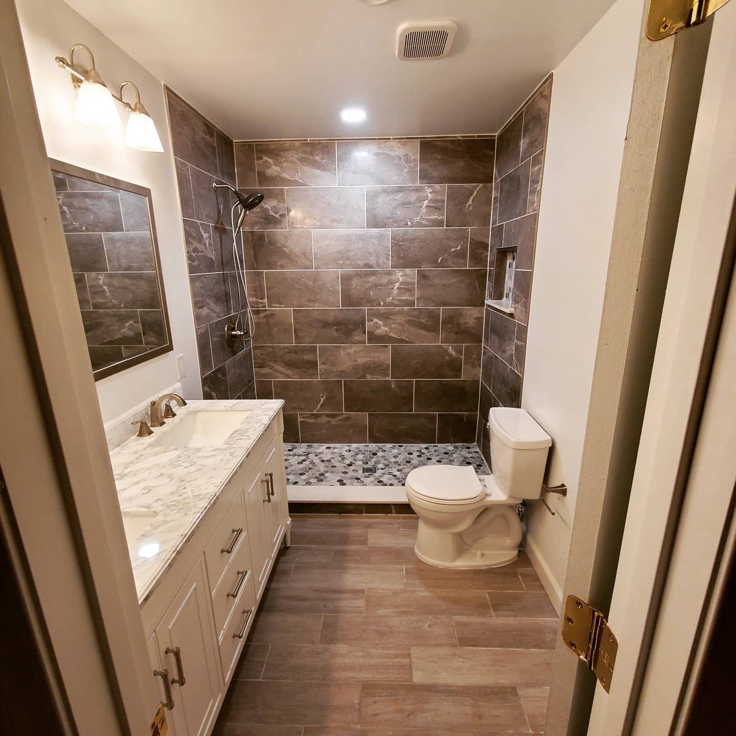 Modernized bathroom with clean finishes and updated fixtures