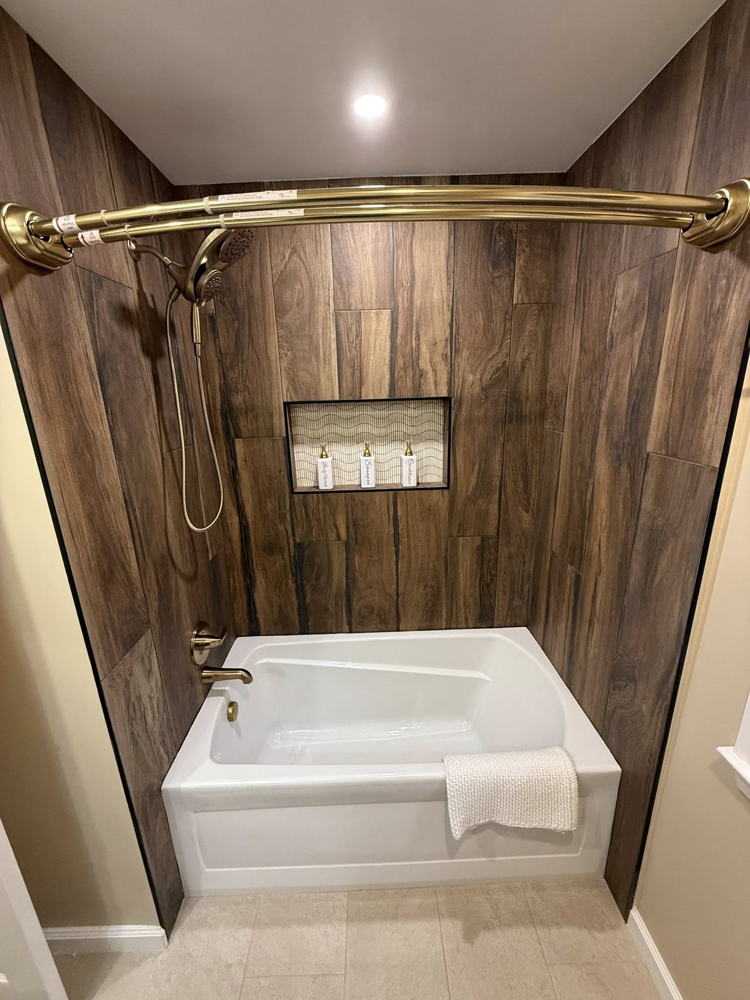 Transformed bathroom featuring new vanity, lighting, and custom finishes