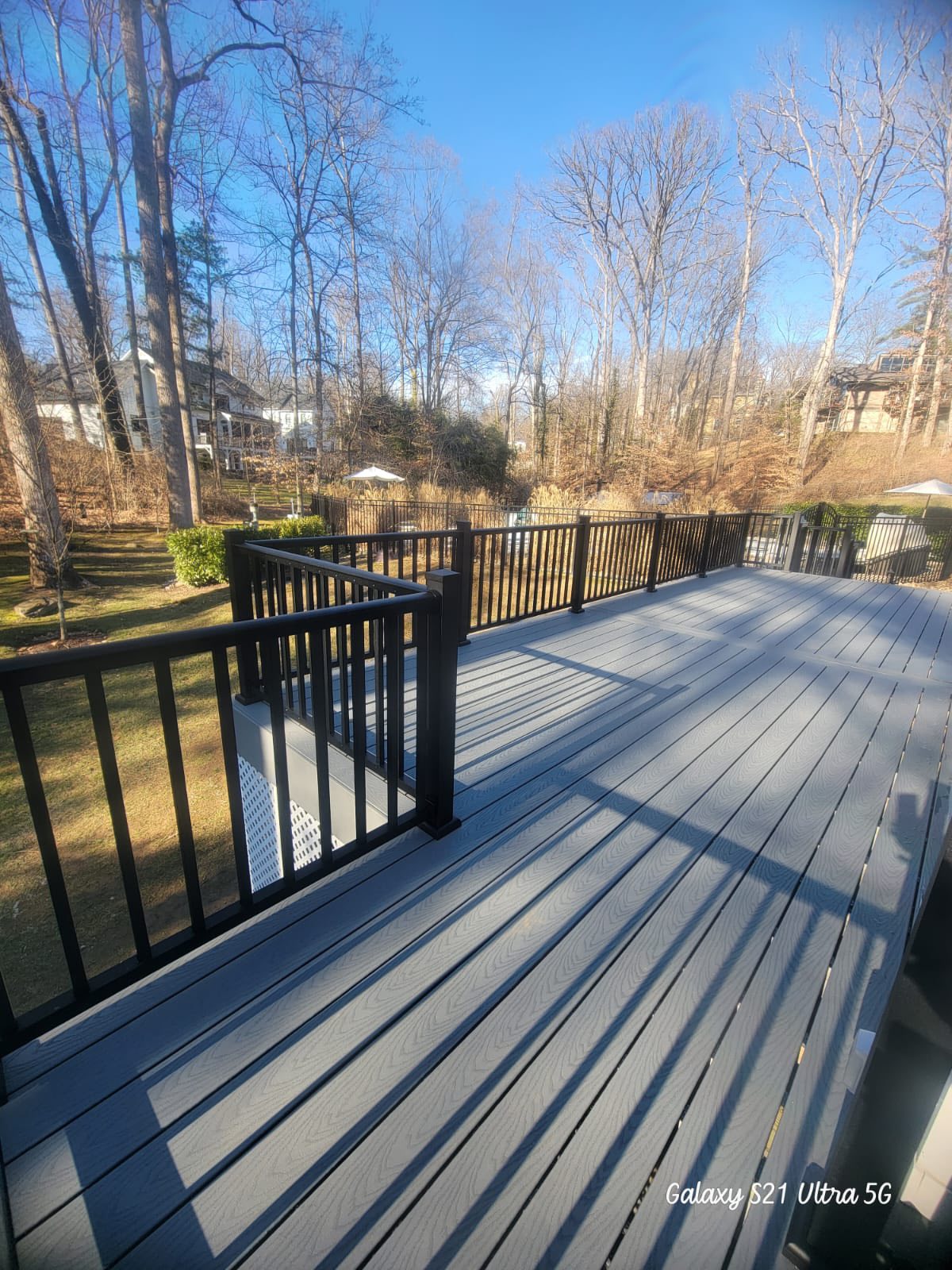 Newly constructed outdoor deck with durable, low-maintenance materials